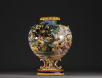 Albarello majolica urn vase decorated with antique scenes.