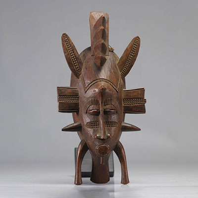 Senufo mask in wood remains of black patina XXth