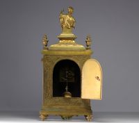 Gilt bronze religious clock in the Louis XIV style.