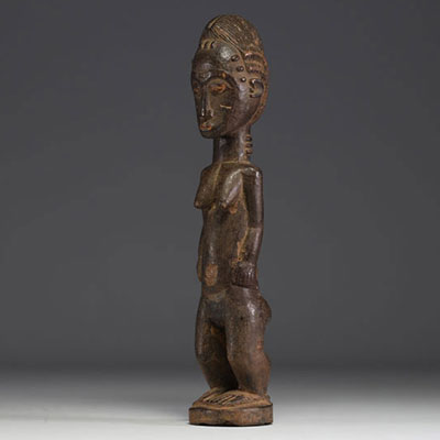 Côte d'Ivoire - Baule female statue in carved wood.