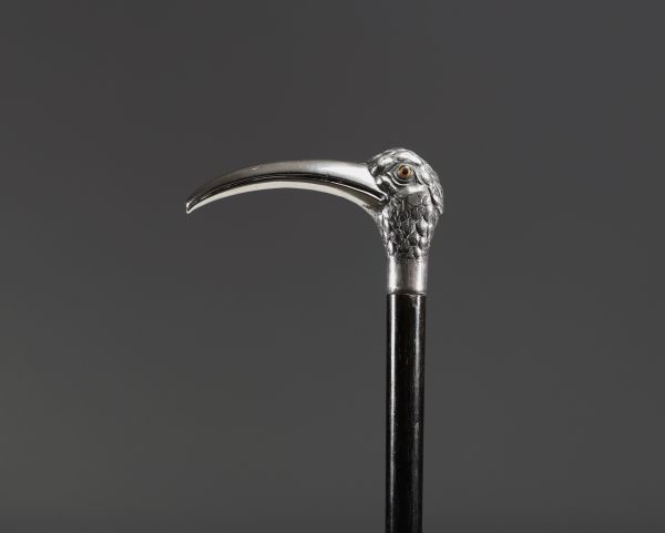Art Nouveau silver cane with Ibis head motif, glass eyes, hallmark 800.