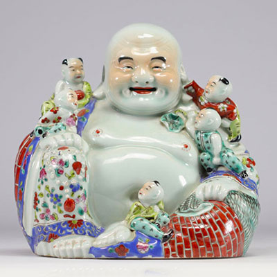 China - Porcelain Buddha surrounded by other small Buddhas, early 20th century.