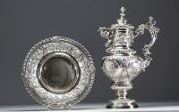 A very imposing ewer and tray in solid silver in the Italian Renaissance style.