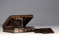 Japan - A lacquer and gold quadrille box decorated with dragons, 18th century.