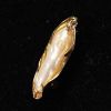 Large freshwater pearl mounted on an 18k yellow gold brooch weighing 8g.