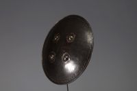 Persia - Shield with four steel ambos, 19th century.