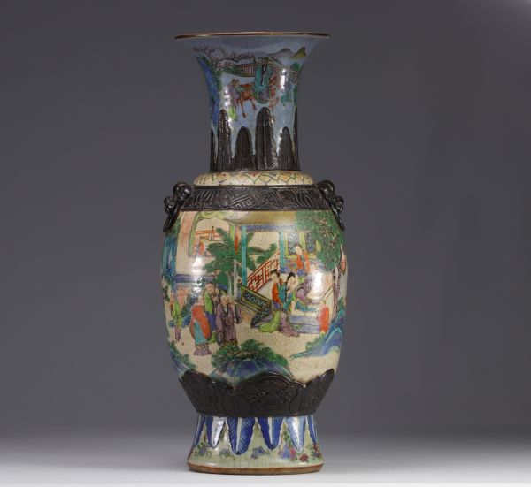 A nanking porcelain vase decorated with characters from 19th century