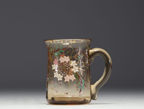 Cristallerie Émile GALLÉ (1846-1904) Small jug with flower decoration in blown and enamelled crystal, signed under the piece.