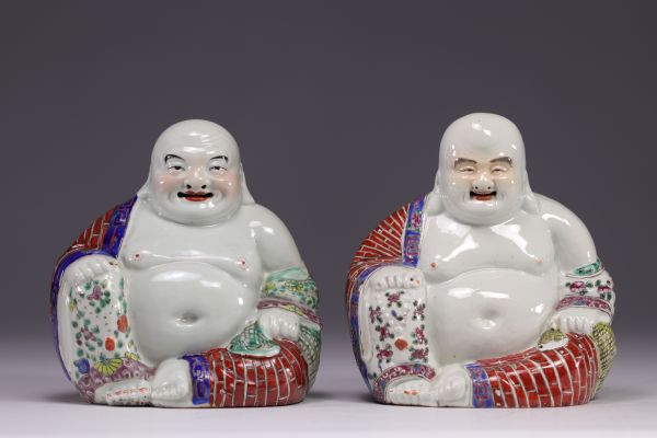 China - pair of Buddha in famille rose porcelain.