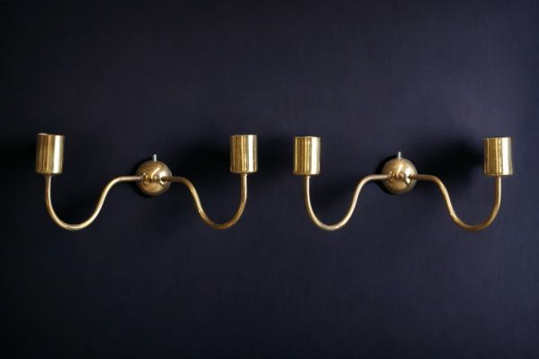 Josef FRANK (1885-1967) Pair of gilt brass sconce candlesticks.