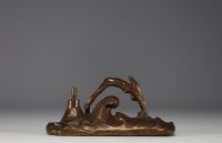 Art Deco bronze table lighter in the shape of a woman diving into the sea.