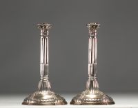 A pair of solid silver candlesticks with column decoration, hallmarked Tournai, Belgium, 18th century.