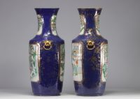 Large pair of blue powdered porcelain vases decorated with scenes of life from the 19th century