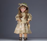 SFBJ - Cast bisque head doll, open mouth, sleeping blue eyes, debossed with SFBJ 301 Paris, between 1899 and 1920.