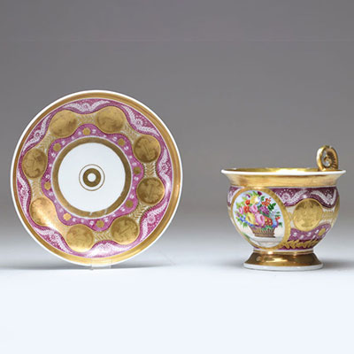 Paris porcelain chocolate cup and saucer decorated with a floral basket, early 19th century