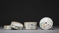 China - Set of four stacking condiment bowls decorated with flowers, famille rose.