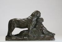 L. BOUCHÉ (19th-20th century) Couple of panthers - Glazed terracotta, signed.