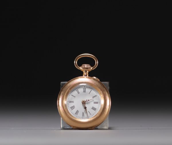 Small 18k gold pocket watch with gold dust cover, gross weight 26.6gr.