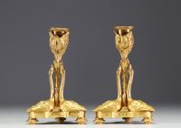 A rare pair of Louis XVI style ormolu candlesticks with swans, first half of the 19th century.e.