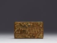 China - Honey-coloured stealite seal in its box.