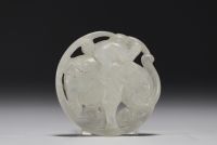 China - White jade plaque decorated with a figure riding an elephant, QING dynasty (1644-1911).
