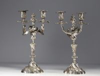 A pair of Louis XV silver-plated bronze candlesticks.