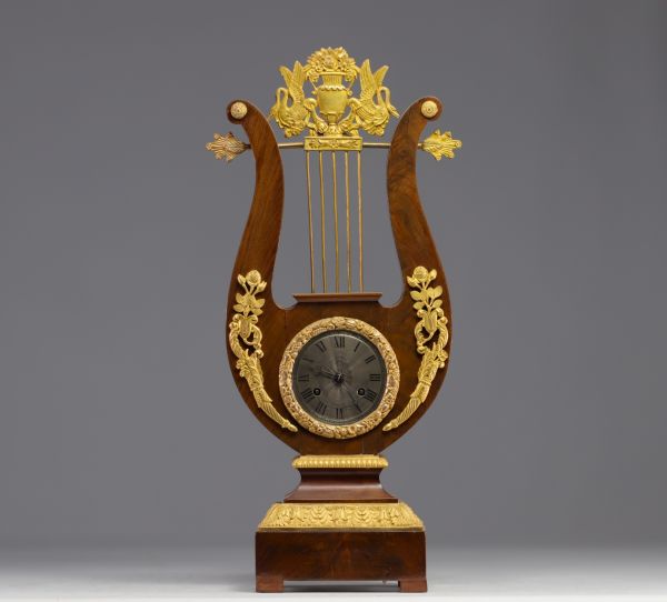 Mahogany veneered and gilt bronze 