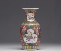 China - Famille rose porcelain vase decorated with figures.