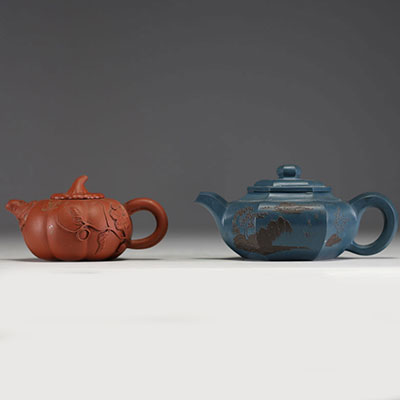 China - Set of two Yixing clay teapots.