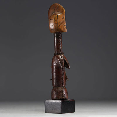 Africa - BURKINA - MOSSI - Fertility doll in carved and scarified wood covered in leather.