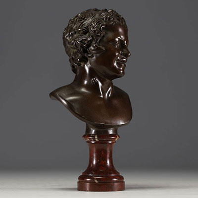 ‘Young Faun’ bronze bust with brown patina on marble base, mark of the Fonderie Nationale des Bronzes ’J. Petermann, Brussels’.