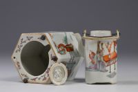 Famille Rose porcelain teapot decorated with figures, 19th century.