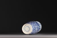 China - A white-blue porcelain baluster vase decorated with lotus flowers, double circle mark, Qing period.