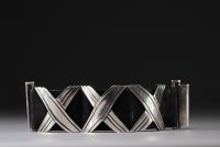 Hector AGUILAR (attributed to) - Modernist silver and leather bracelet.