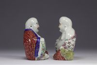 China - pair of Buddha in famille rose porcelain.