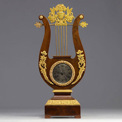 Mahogany veneered and gilt bronze 