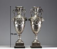 Imposing pair of Louis XVI chased and repoussé silver vases, hallmarks of Paris, 18th century.