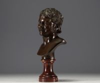 ‘Young Faun’ bronze bust with brown patina on marble base, mark of the Fonderie Nationale des Bronzes ’J. Petermann, Brussels’.