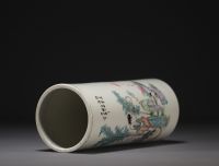 China - Famille rose porcelain brush-holder decorated with figures.