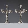 A pair of Louis XV style silver-plated bronze candelabras, 19th century.