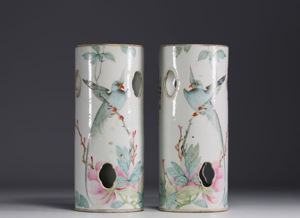 China - A pair of porcelain hat stands decorated with birds, flowers and poems.