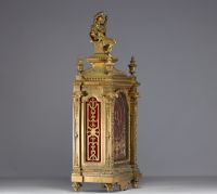 Gilt bronze religious clock in the Louis XIV style.