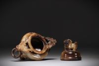 China - Tripod incense burner in brown jade, decorated with Fô dog and dragon head.