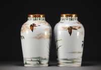 Taxile DOAT (1851-1938) - Pair of Japanese porcelain vases decorated with birds, circa 1900.