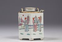 Famille Rose porcelain teapot decorated with figures, 19th century.