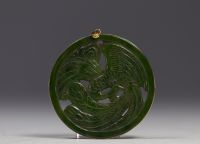 China - green jade pendant with Phoenix design, 14K gold mount, Qing period.