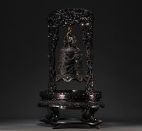 China - Bronze bell surmounted by a dragon, supported by a carved wooden base, circa 1900.