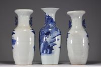 China - Set of three white and blue porcelain vases decorated with landscapes.