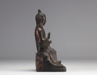 Bronze statue of a traditional figure with dark patinas and traces of gilding from Ming period China (明朝)