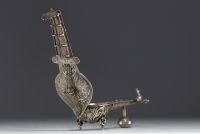 India - Burma - Solid silver Betel box in the shape of a sitar topped by a peacock, 19th century.